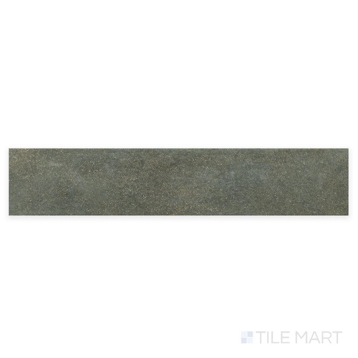 This close-up shot of Stage Forest 2.5X12 matte porcelain tile enhances its deep green shade and fine matte texture, perfect for nature-inspired designs.