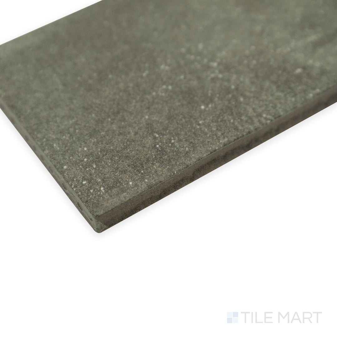 Corner shot of Stage Denim 2.5x12 matte porcelain tile, capturing its subtle blue color, velvety matte finish, and precisely aligned corner detail.