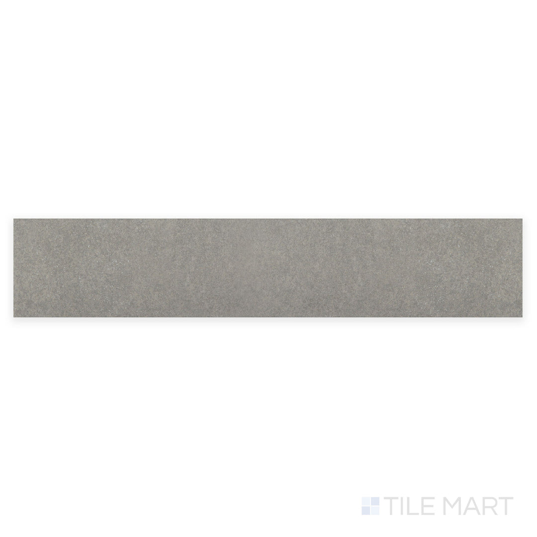 A magnified view of Stage Grey 2.5X12 matte porcelain tile captures its cool grey tone and smooth matte finish, making it ideal for modern, minimalist aesthetics.