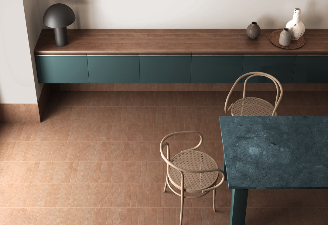 A rich and warm tone that evokes an earthy aesthetic, complemented by Stage Terracotta 2.5X12 Matte Porcelain.