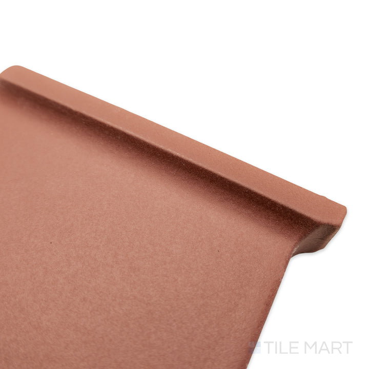 Angled view of Quarry + Red 6x6 matte ceramic outside corner right, showcasing a rich red hue with a well-defined corner edge and matte finish.