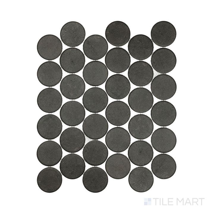 Photographed from above, the Stage Charcoal 2" penny round matte porcelain mosaic reveals deep gray hues and consistent round patterning.
