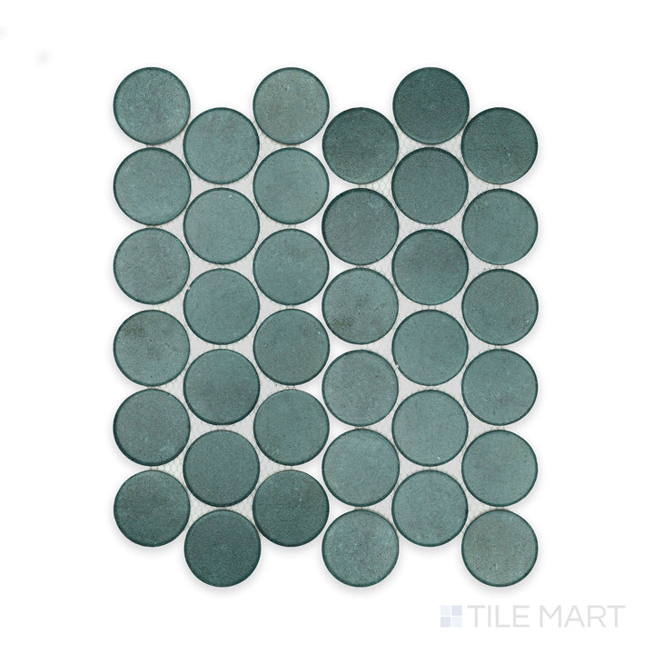 Top-down shot of the Stage Denim 2" penny round matte porcelain mosaic tile, highlighting its cool blue tone and precise penny round formation.
