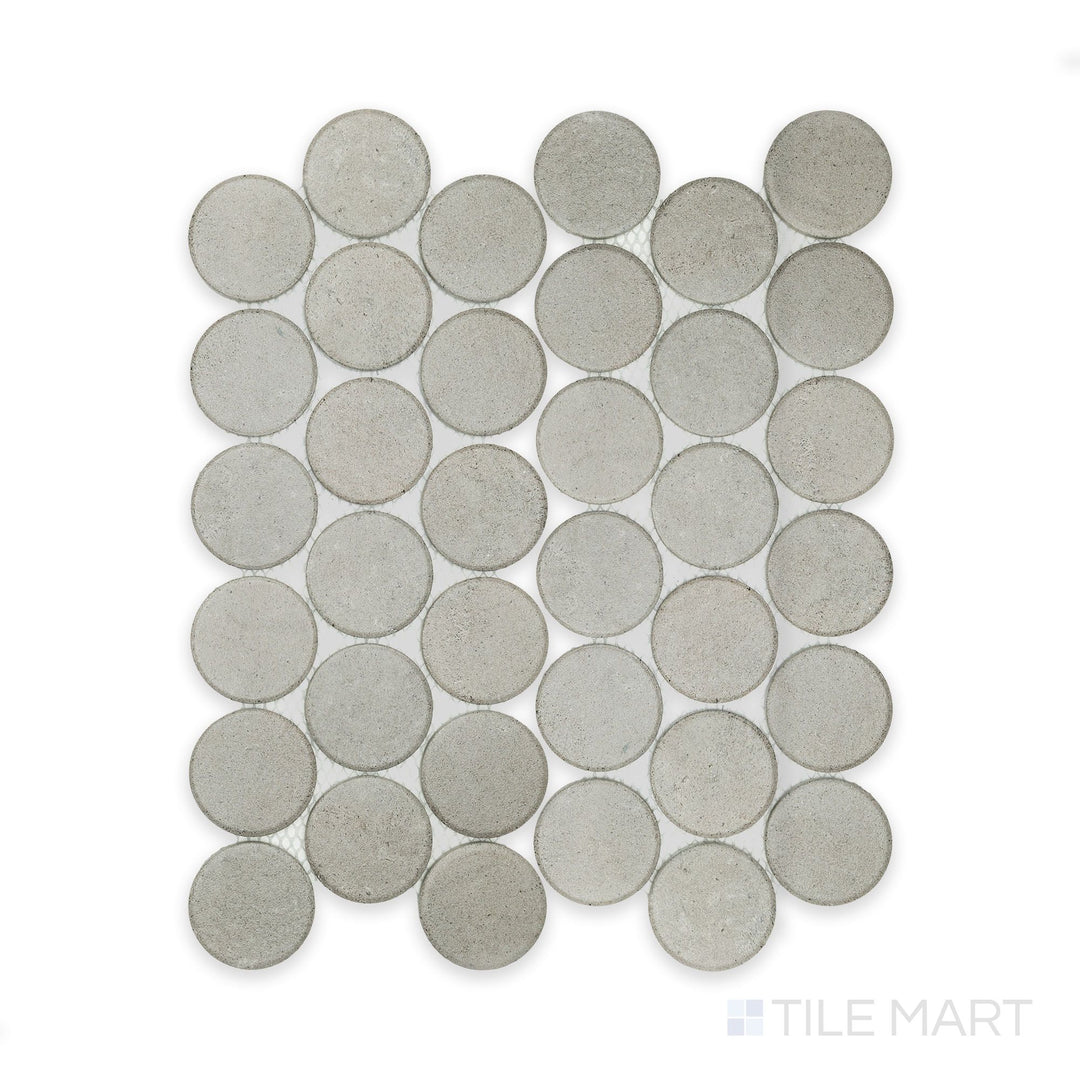 Stage Grey 2" penny round matte porcelain mosaic tile seen from directly above, capturing its neutral tone and evenly spaced round design.