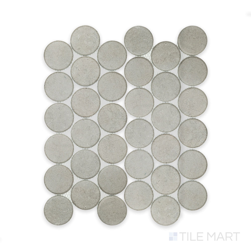 Stage Grey 2" penny round matte porcelain mosaic tile seen from directly above, capturing its neutral tone and evenly spaced round design.