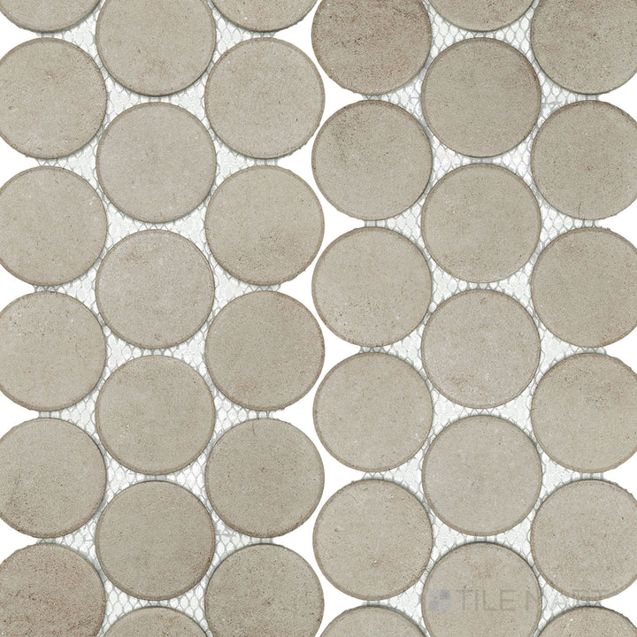 Stage Taupe 2" penny round matte porcelain mosaic tiles in a grid layout, showing their warm neutral coloring and classic round tile style.