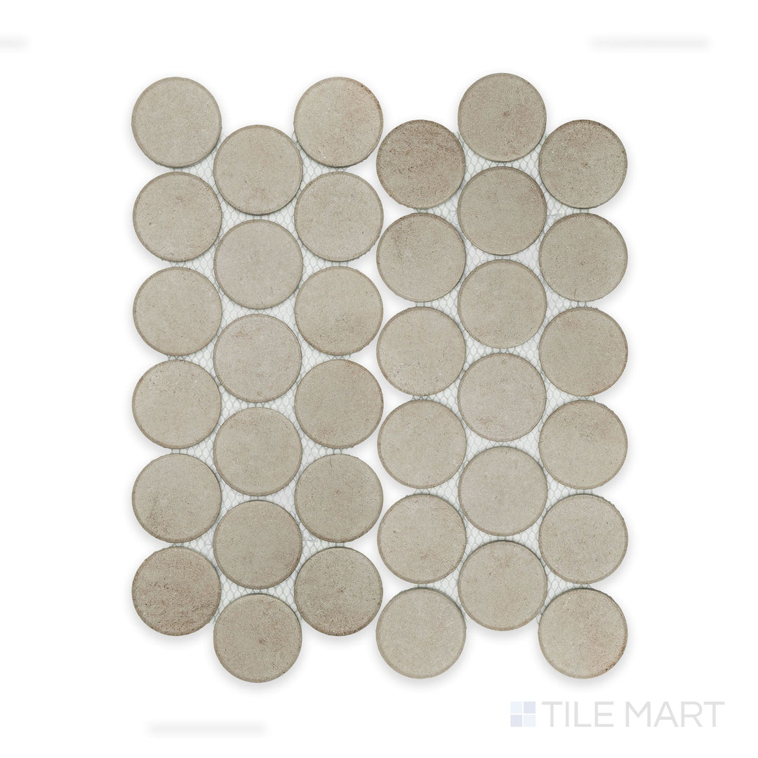 Top-down view of Stage Taupe 2" penny round matte porcelain mosaic sheet, featuring a soft, warm taupe palette and a regular penny round configuration.