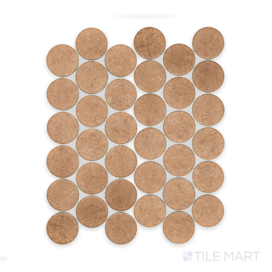 Seen from overhead, the Stage Terracotta 2" penny round matte porcelain mosaic tile presents warm reddish-brown tones and symmetrical round arrangement.