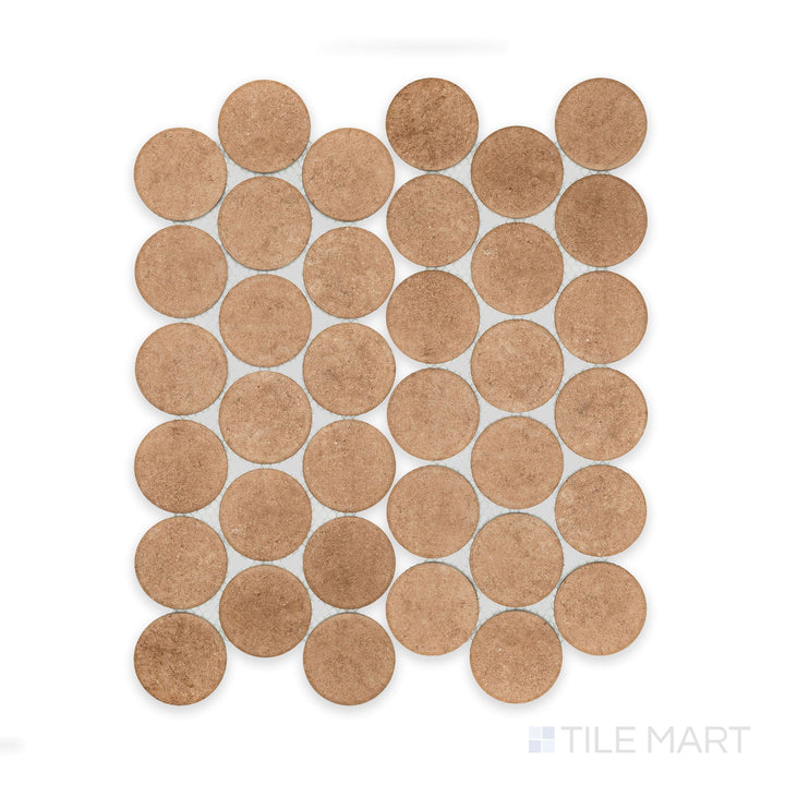 Seen from overhead, the Stage Terracotta 2" penny round matte porcelain mosaic tile presents warm reddish-brown tones and symmetrical round arrangement.