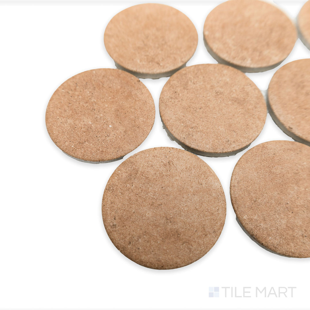 Stage Terracotta 2" penny round matte porcelain mosaic captured from the corner, with rustic orange hues and the mosaic’s full edge profile.