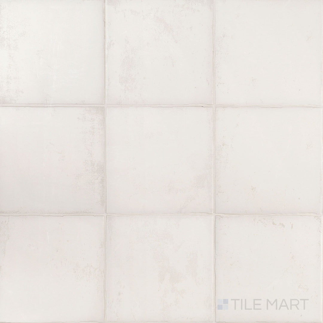 Overview of Fuego Blanco 9x9 matte porcelain tile featuring a soft white tone with subtle texture and a classic square format.