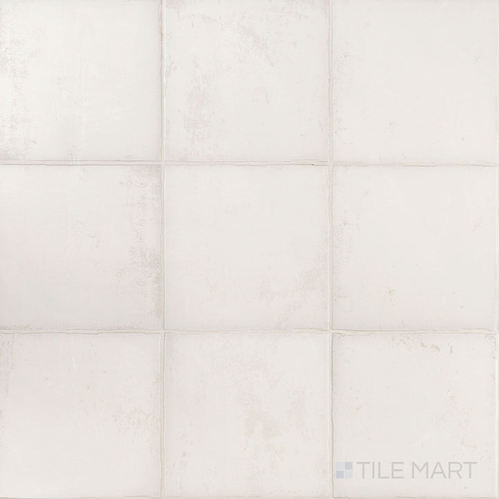Overview of Fuego Blanco 9x9 matte porcelain tile featuring a soft white tone with subtle texture and a classic square format.