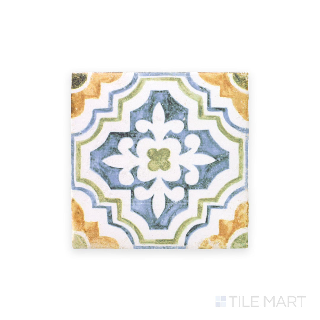 This full tile is viewed from the top, showcasing the artistic patterns and aged finish of the Fuego Huella Deco 9x9 matte porcelain tile.