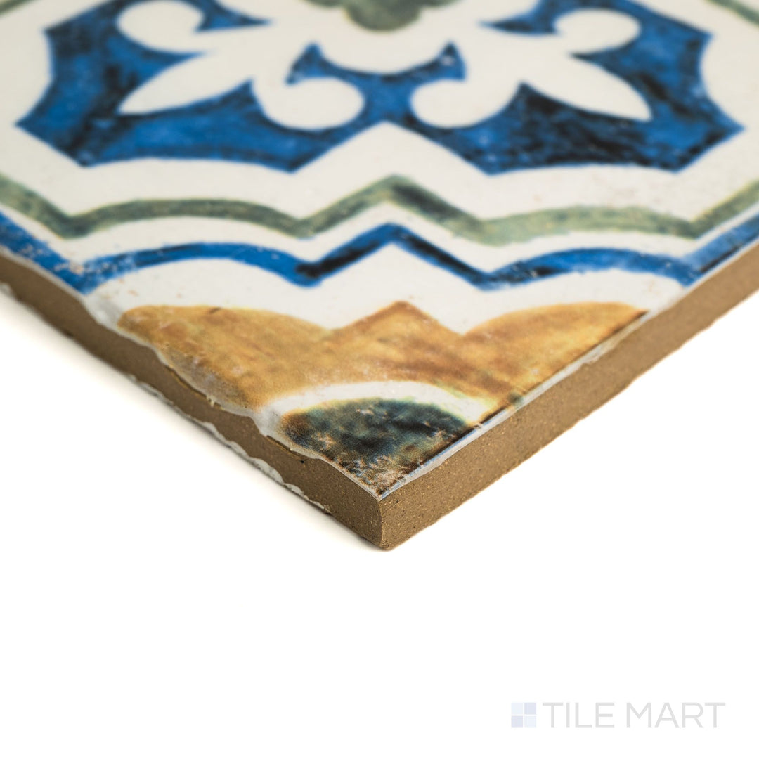 Fuego Huella Deco 9x9 matte porcelain tile captured from a corner perspective, featuring artistic surface detail and full tile edge clarity.