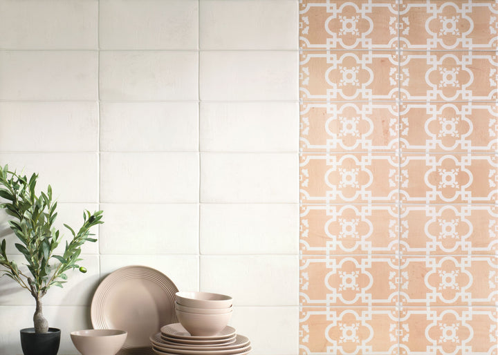 Fuego Era Deco 9x9 matte porcelain tile applied in a finished surface, featuring decorative motif, muted earthy hues, and aged ceramic charm.