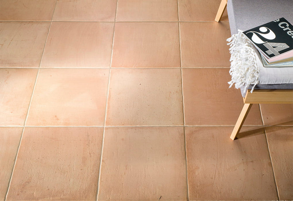 Fuego Natural 9x9 matte porcelain tile installed in a final layout, featuring organic texture and neutral tones for a natural stone-inspired appearance.