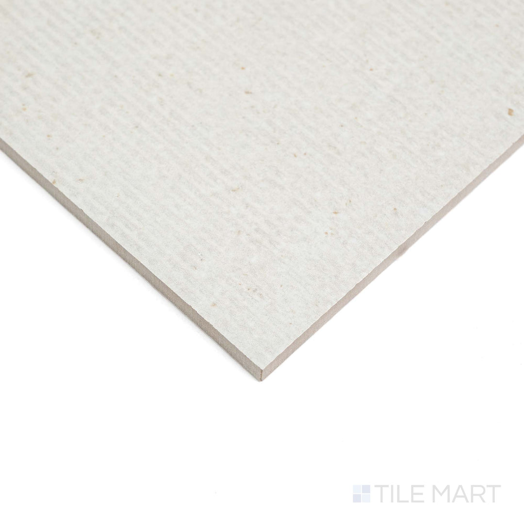 Lime Evolution Ice Deco 24X48 tile appears at an angle, showcasing decorative matte design and clean lines.
