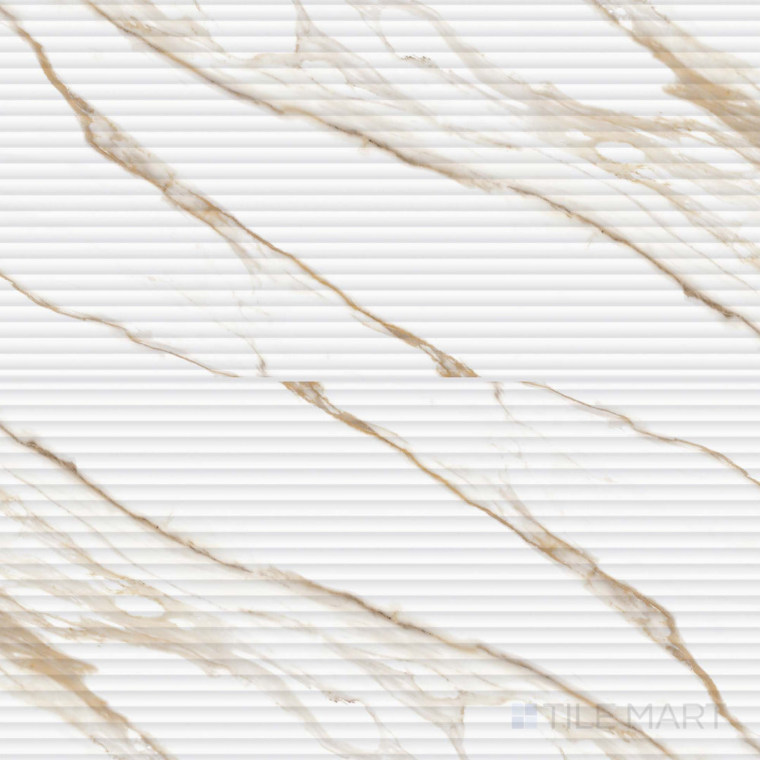 Full tile display of Prestigio Calacatta Oro 3D Deco 24x48 matte stone tiles, featuring raised decorative detail and rich marble veining.