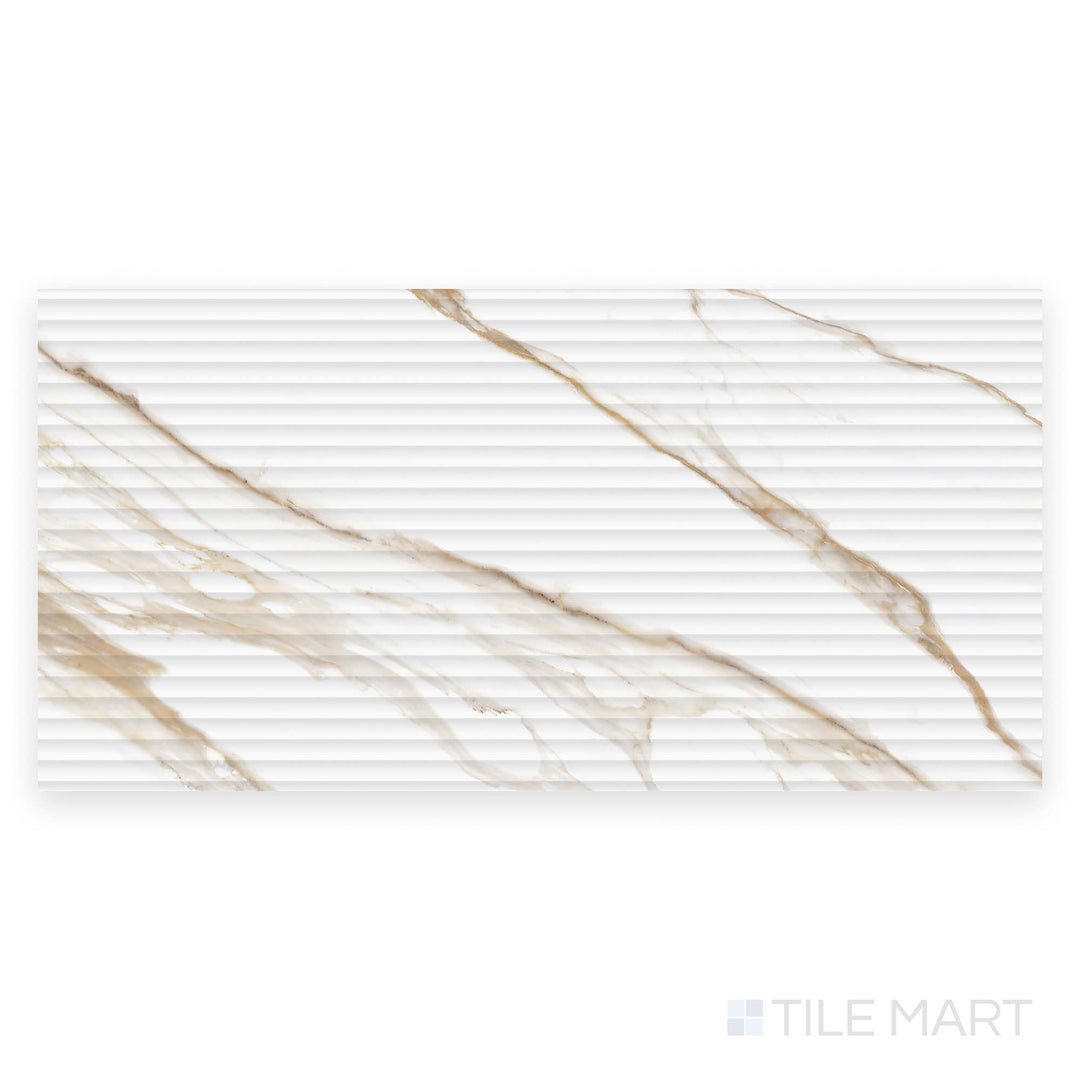 From a top view, the Prestigio Calacatta Oro 3D Deco 24x48 matte stone tile reveals its raised decorative surface with rich marble veining.