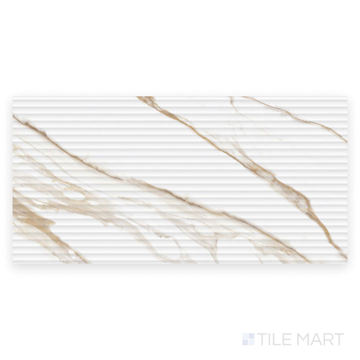 From a top view, the Prestigio Calacatta Oro 3D Deco 24x48 matte stone tile reveals its raised decorative surface with rich marble veining.