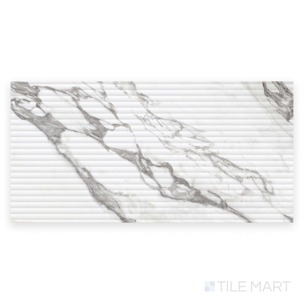 This top-down image captures the Prestigio Arabescatto 3D Deco 24x48 matte stone tile in full, with carved texture and dynamic gray veining.