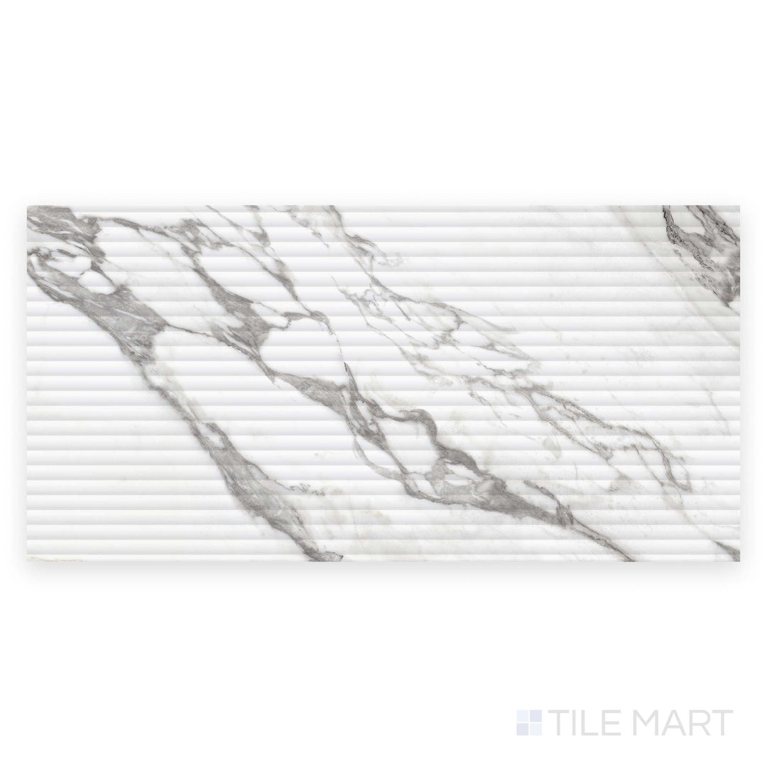 This top-down image captures the Prestigio Arabescatto 3D Deco 24x48 matte stone tile in full, with carved texture and dynamic gray veining.