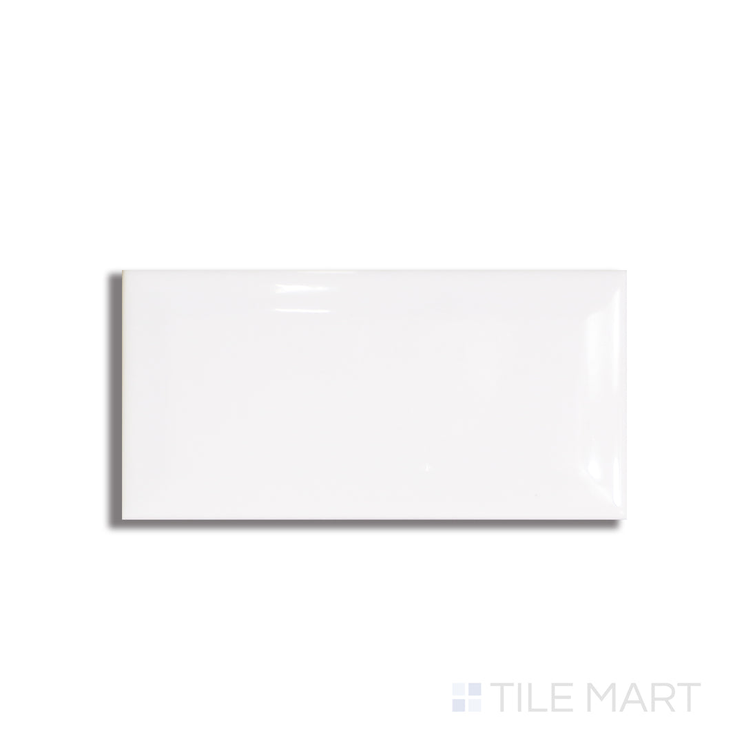Flat layout of Basics White 3x6 beveled glossy ceramic tile, featuring raised edges and high-shine finish for added dimension.