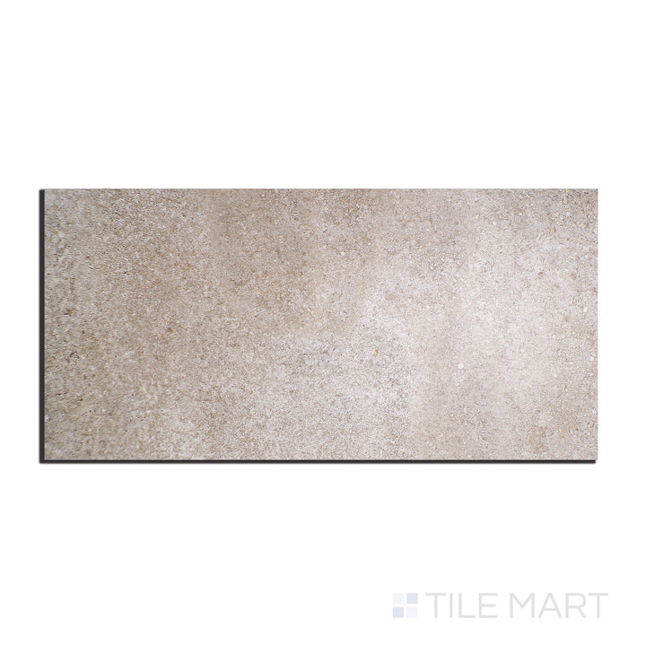 Top-down view of Brooklyn Cemento Greige 24x48 honed porcelain tile, showcasing smooth stone-inspired texture in a warm greige tone.