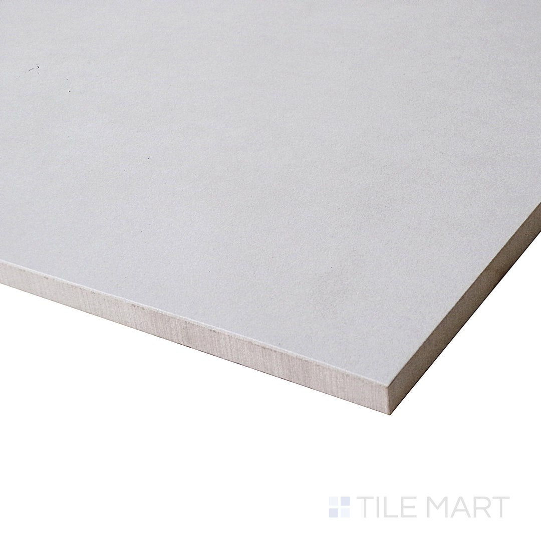 Kadence Gris tile shown at an angle highlights its smooth matte finish and contemporary grey tone.