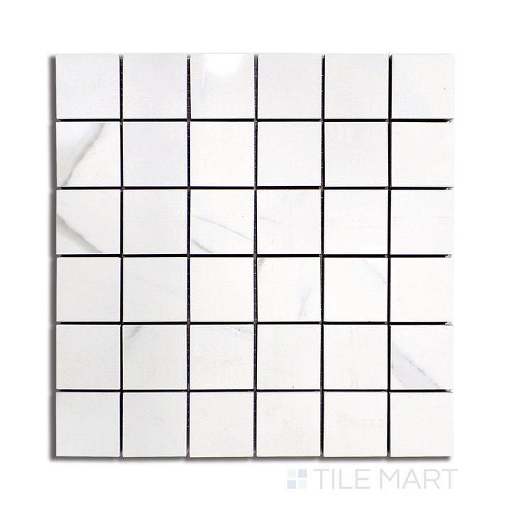 Top-down image of Marmolab Calacatta 2" square glossy porcelain mosaic tile, highlighting crisp marble veining in a classic grid pattern with polished finish.