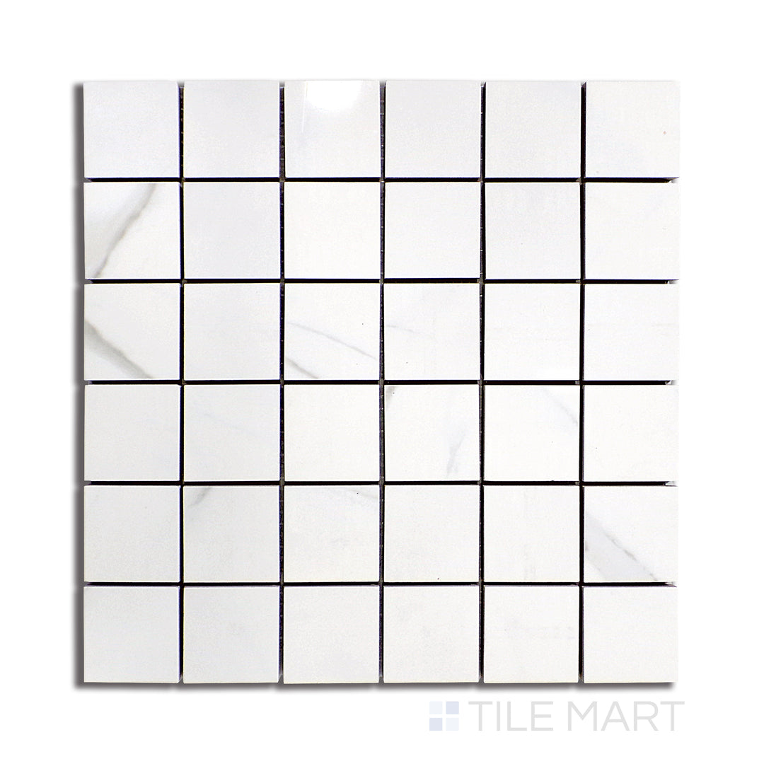 Top-down image of Marmolab Calacatta 2" square glossy porcelain mosaic tile, highlighting crisp marble veining in a classic grid pattern with polished finish.