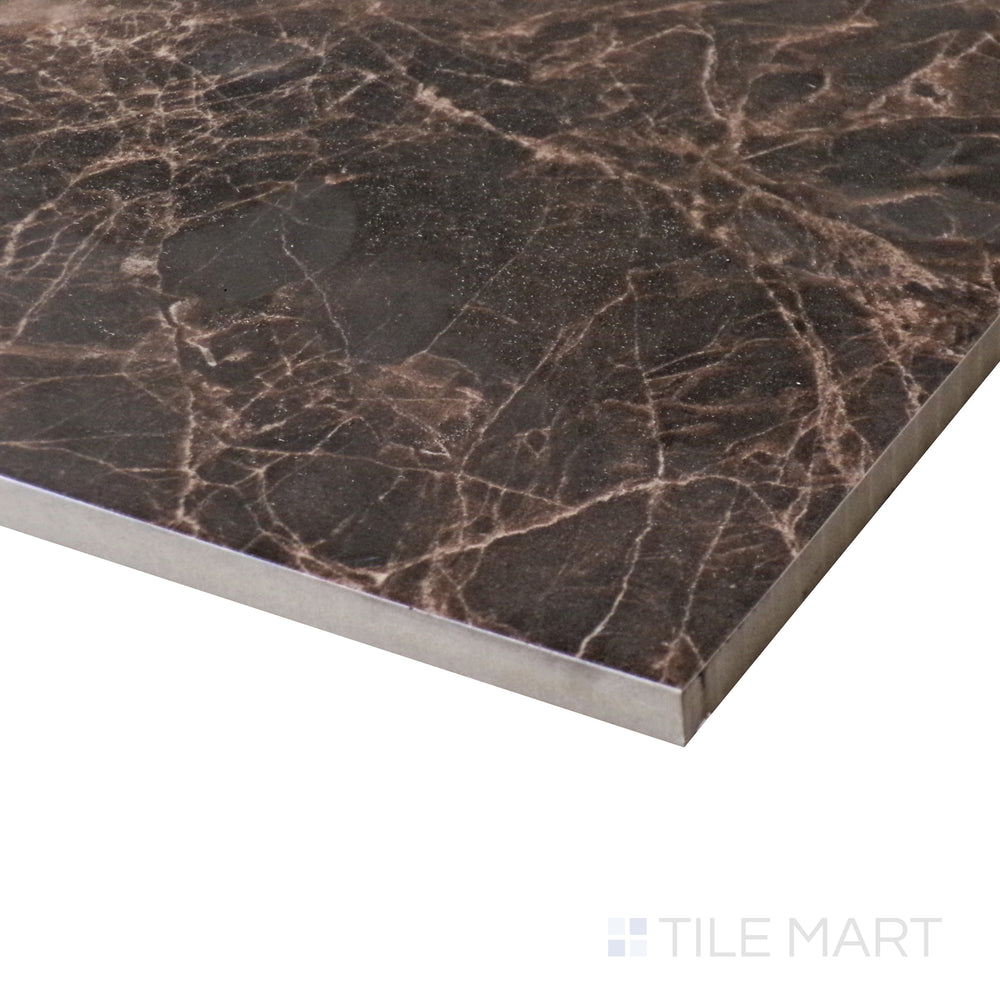 This dark and dramatic Emperador Marble tile gleams under light in a polished corner view.