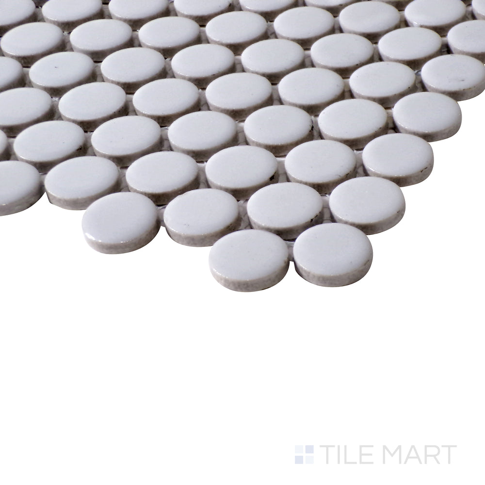 Glossy Pure Grey penny rounds reflect light beautifully from a clean corner perspective.
