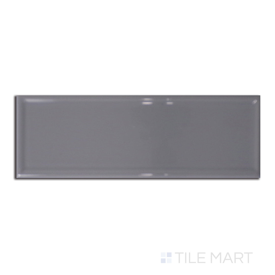 Roxy Hematite 3x9 glossy porcelain tile shown from above, with a sleek metallic grey tone and polished surface for modern appeal.