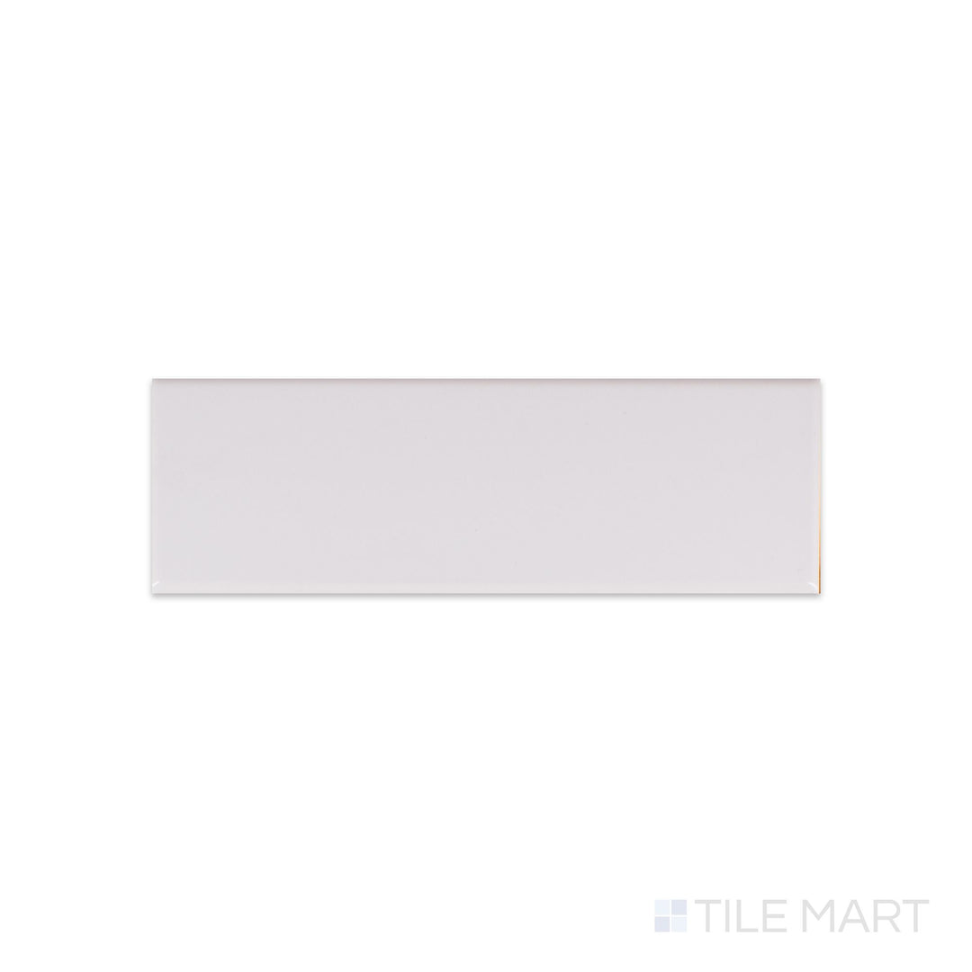 Flat layout of Roxy Quartz 3x9 glossy porcelain tile, reflecting a subtle shimmer and neutral tone ideal for elegant designs.