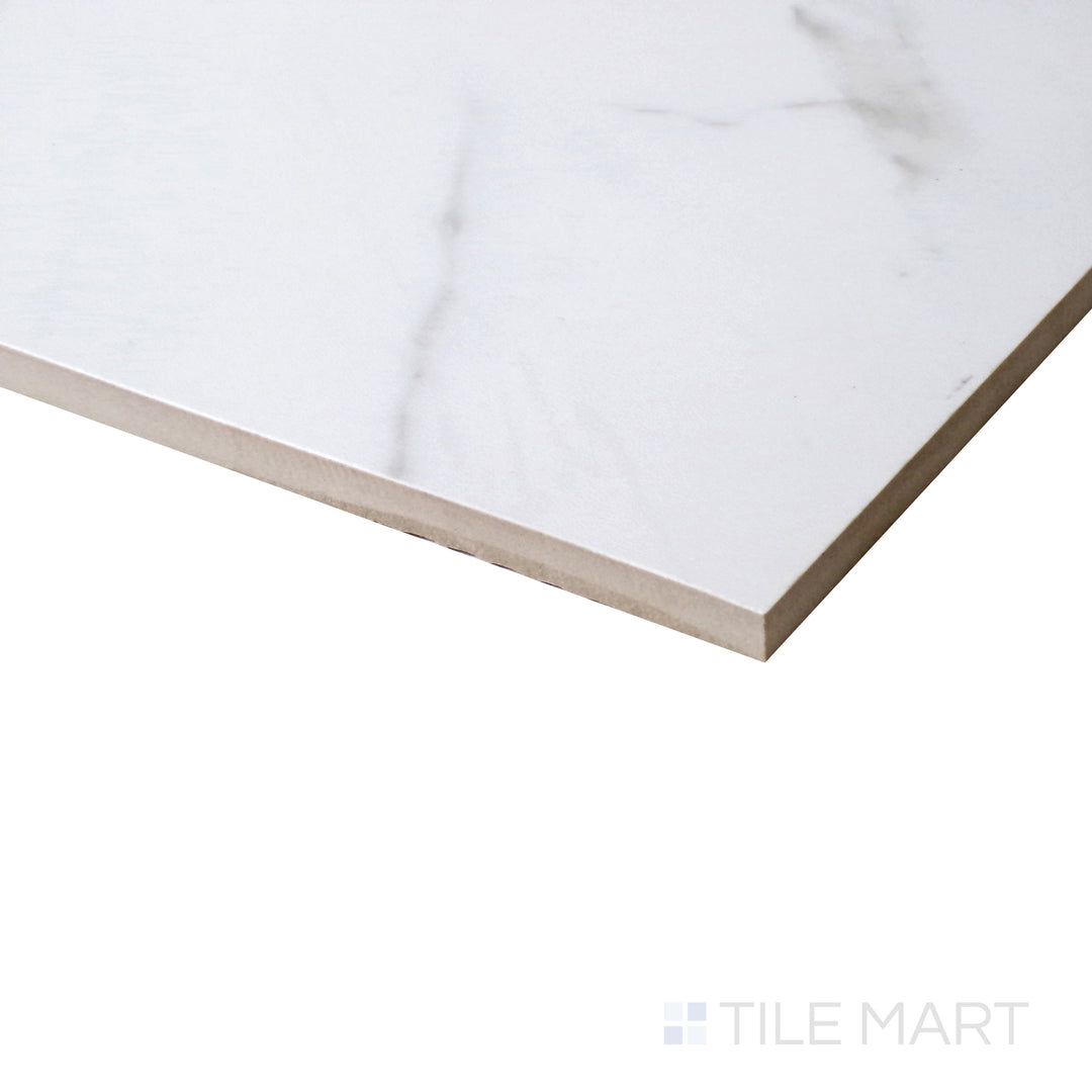 Select Carrara White tile displays clean veining and reflective polish in this angled shot.