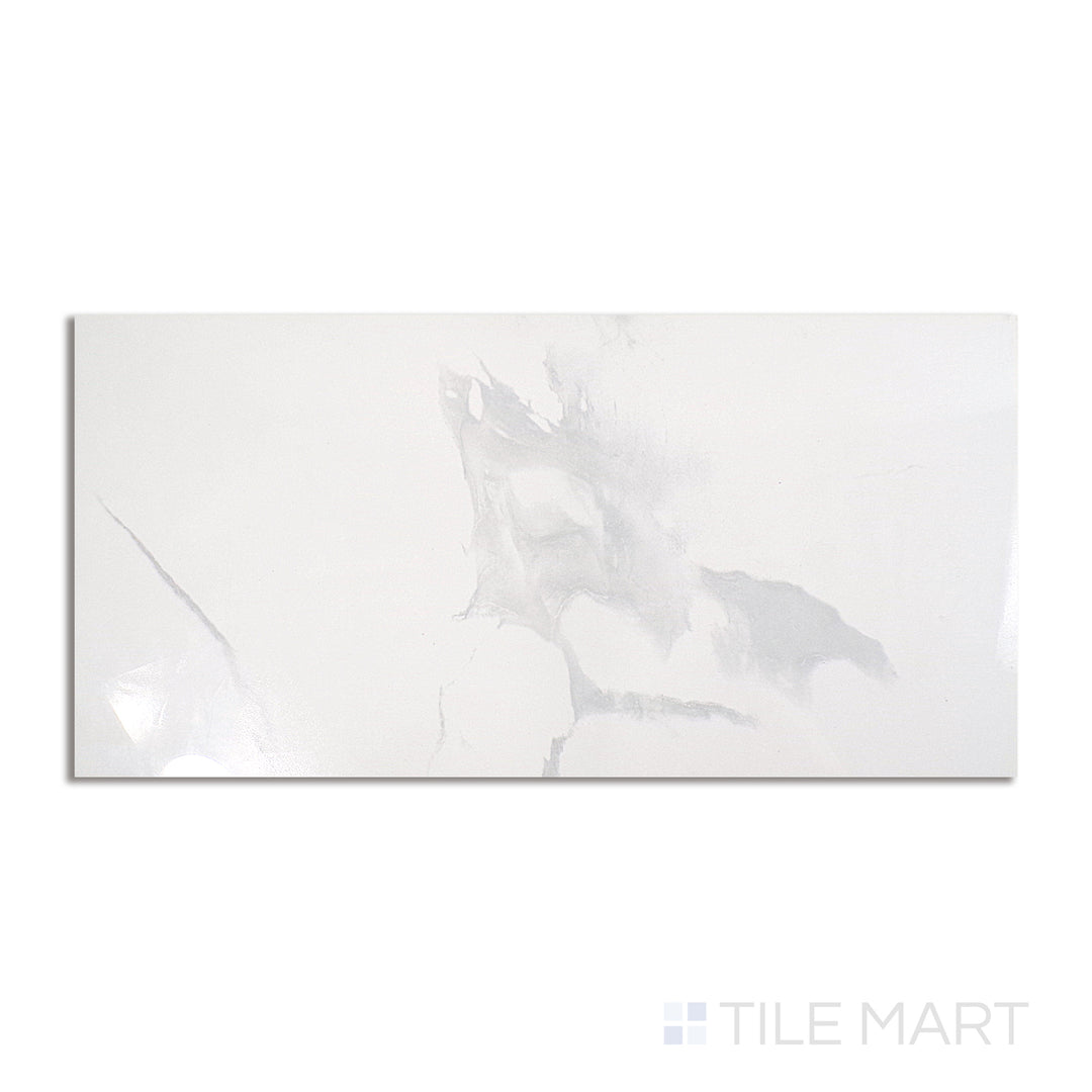 Top-down shot of Stonelook Marble Cloud 12x24 matte porcelain tile, featuring soft cloud-like marble patterns in muted grey hues.