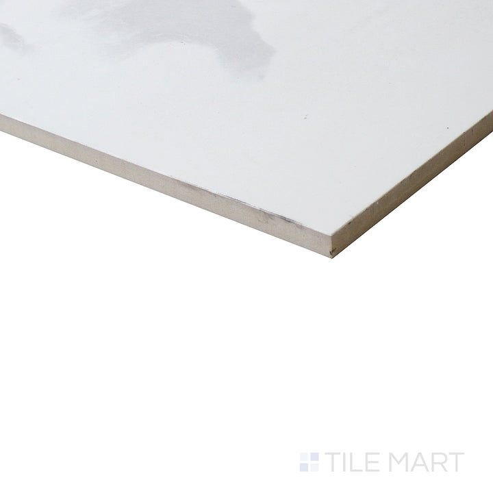 Soft, matte Marble Cloud tile is shown from the corner, emphasizing its natural stone texture.