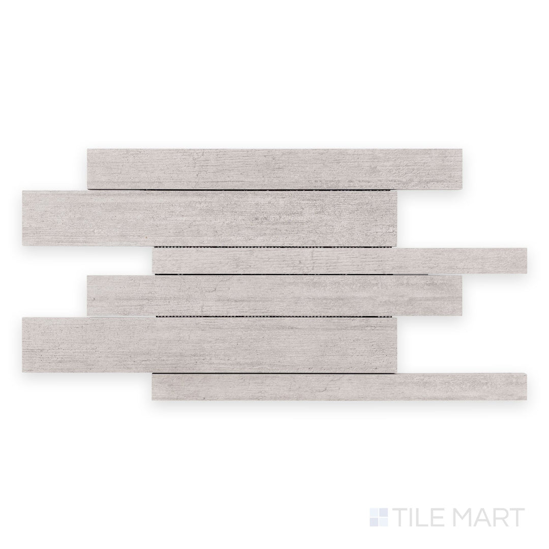 Overhead image of Cemento Light Grey 12x24 matte porcelain mosaic tile with subtle concrete texture in soft grey hues.