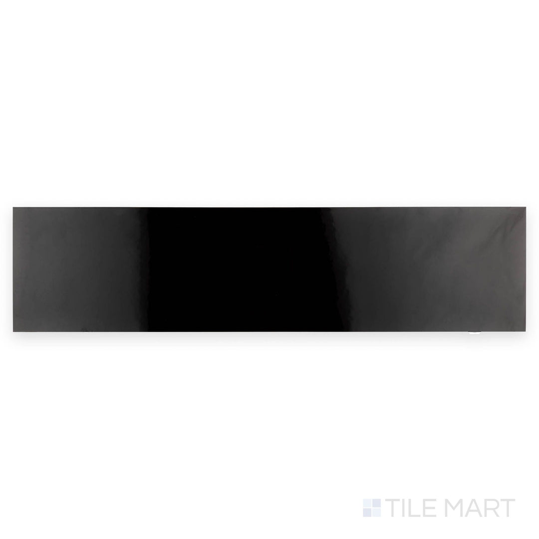 Brillo Black 5.5x24 polished porcelain tile captured from above, with a sleek black glossy surface and elongated plank style.