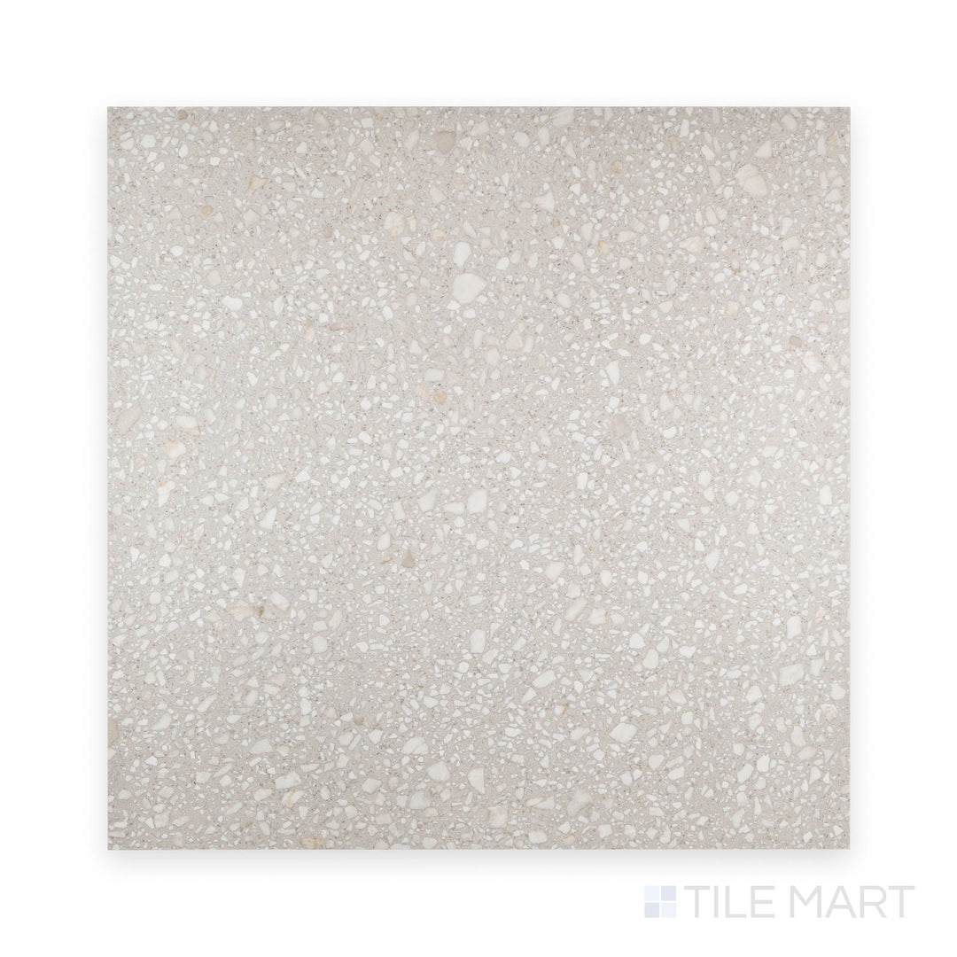 Santorini Gris 24x24 semi gloss porcelain tile captured in a flat lay, offering a neutral gray shade with smooth sheen.