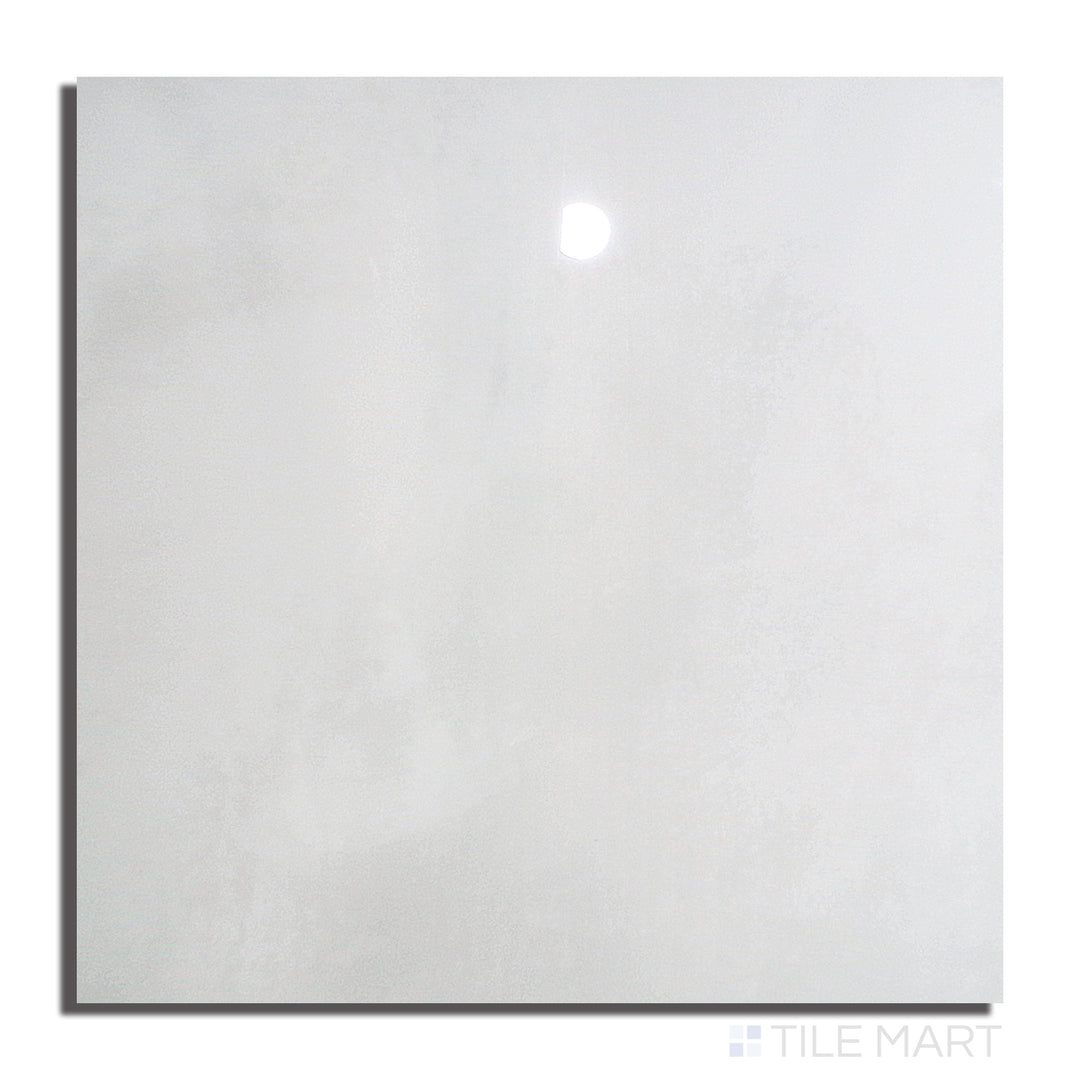 Overhead shot of Kadence Blanco 48X48 Polished Porcelain, displaying a luminous white surface with a reflective polished finish.