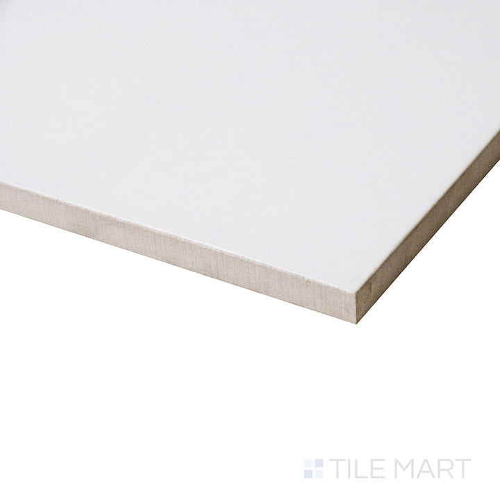 A side perspective captures the glossy elegance of this Blanco tile, reflecting light beautifully across its polished surface.