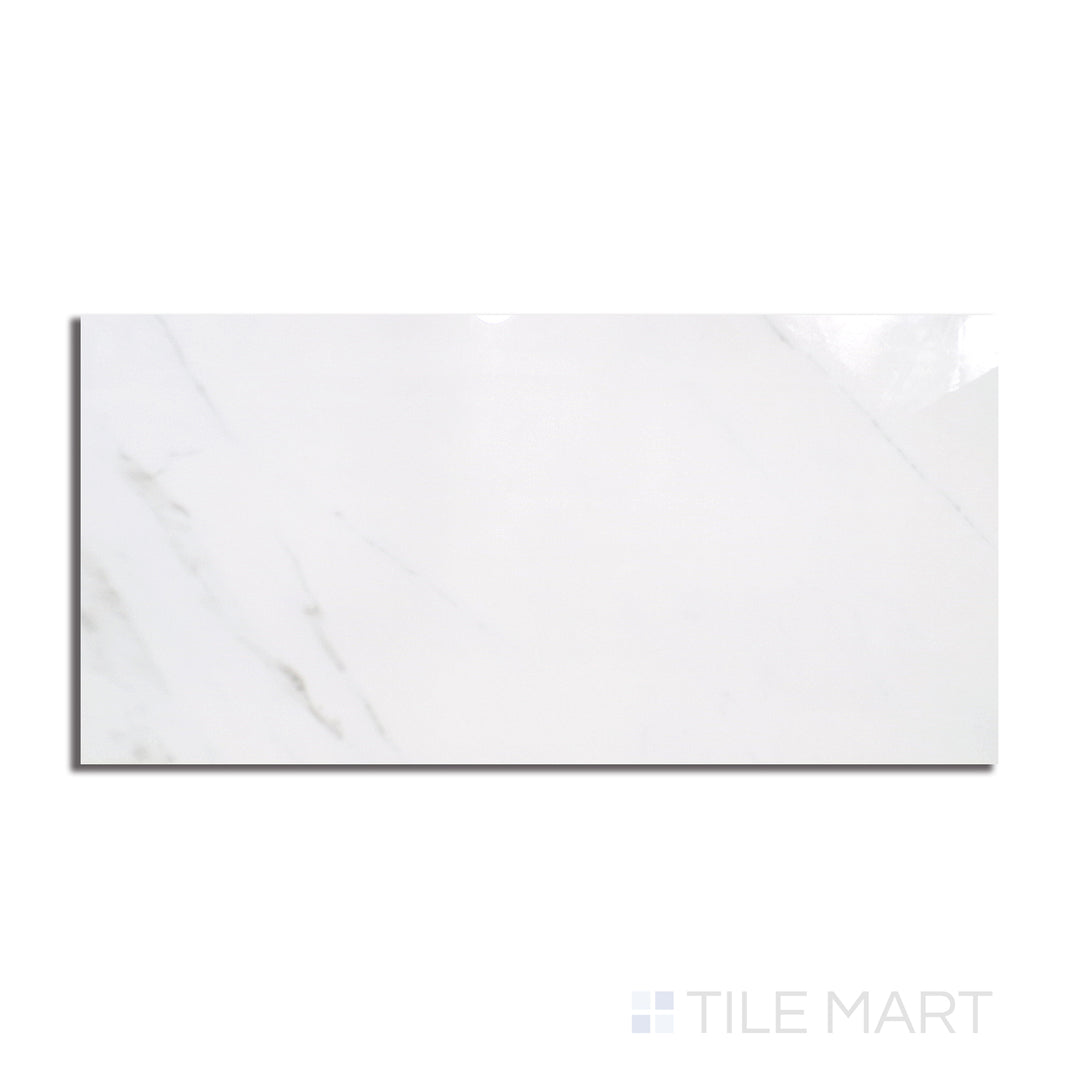Top-down shot of Marmolab Calacatta 12X24 Glossy Porcelain, featuring a white marble look with striking grey veining and a high-gloss finish.