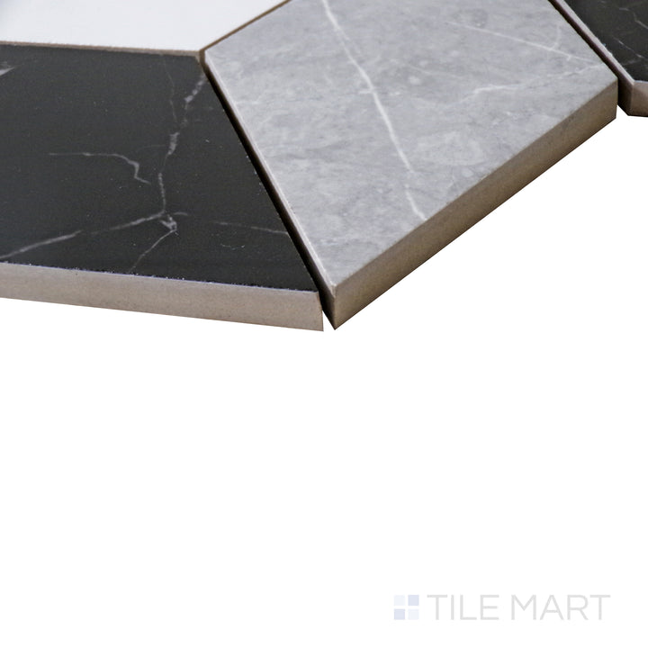 Angled close-up emphasizing the harmonious blend of tones in the Marmolab Mix 2" square glossy porcelain mosaic.