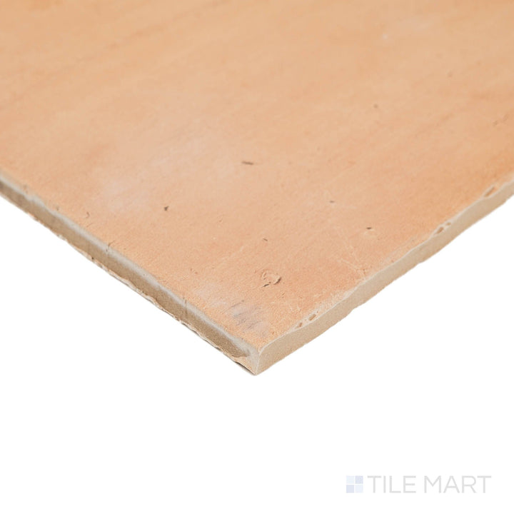 Corner detail of Fuego Natural 18x18 matte porcelain tile with R11 finish and earthy tonal depth