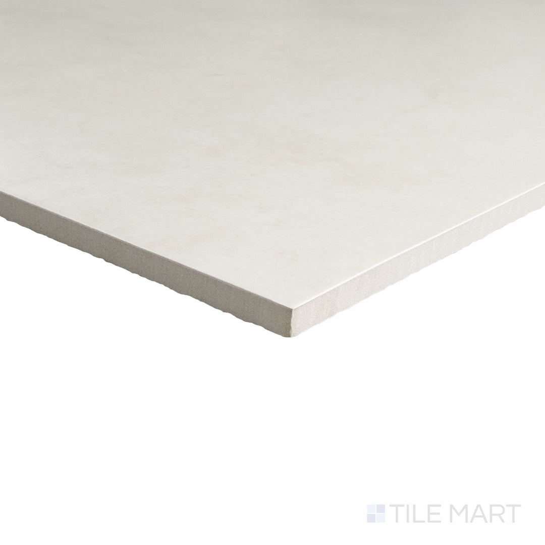 Lugano Marfil 48x48 matte porcelain tile shown in corner view highlighting expansive scale and gentle tonal depth