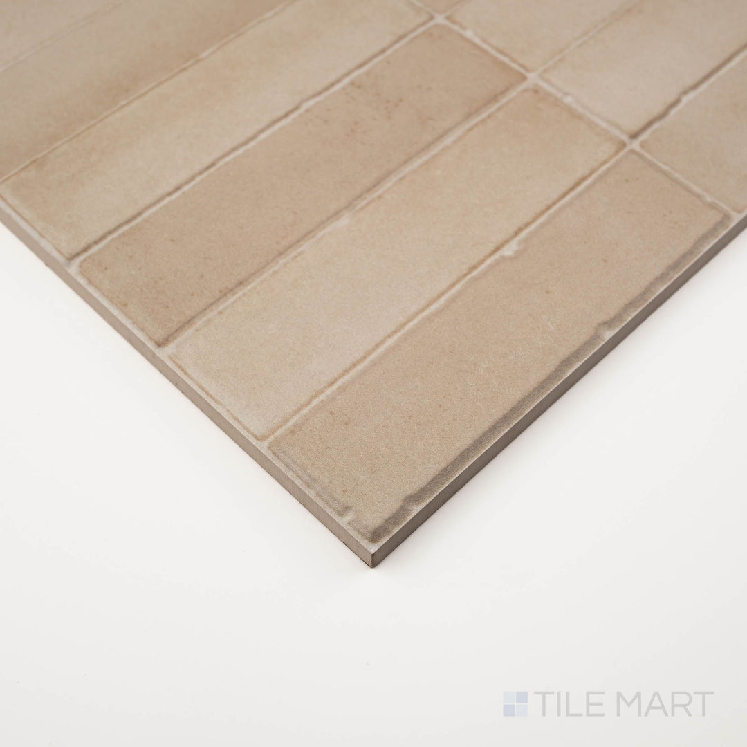 Daster 3D Cream 16x48 matte porcelain tile shown at corner angle with sculpted surface and dimensional relief