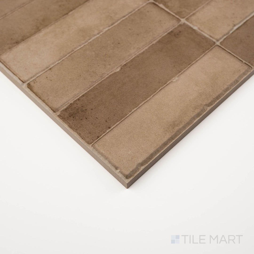 Daster 3D Nut 16x48 matte porcelain tile in corner view showcasing dimensional surface and warm tonal depth