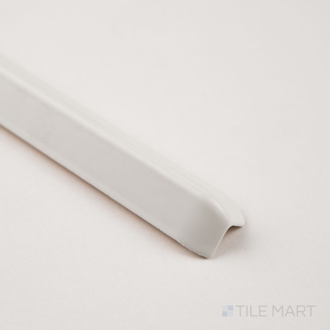 Corner angle of white sanitary cove base 1x6 outside corner matte ceramic trim with molded exterior profile